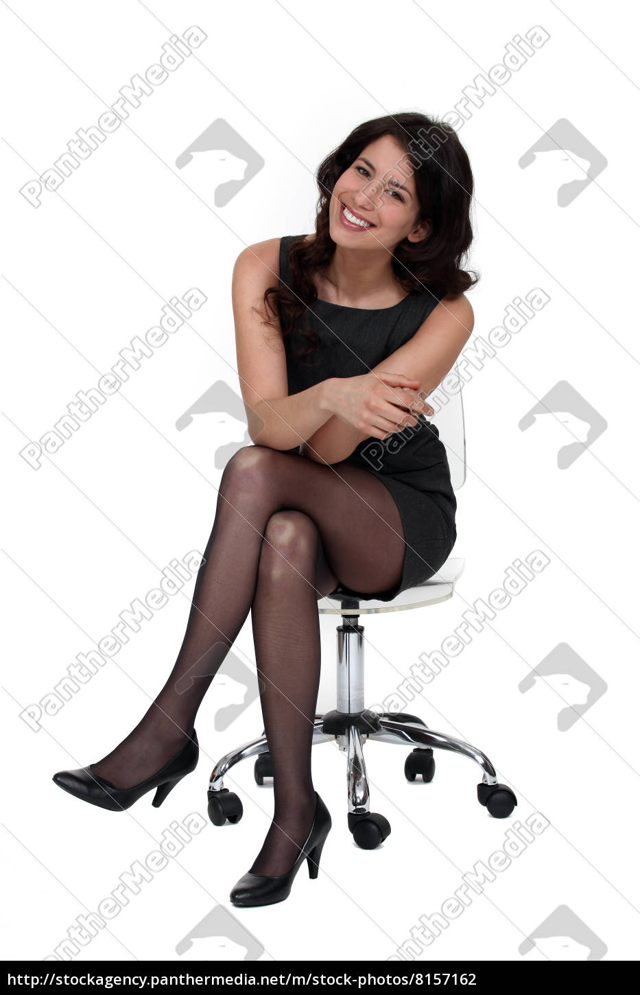 donna sexy seduta su una sedia - Stockphoto #8157162